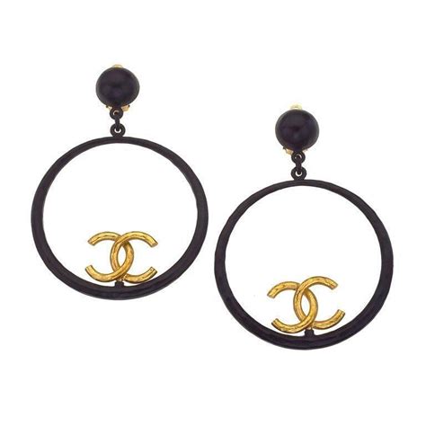 chanel earrings plastic round black and gold|genuine chanel earrings uk.